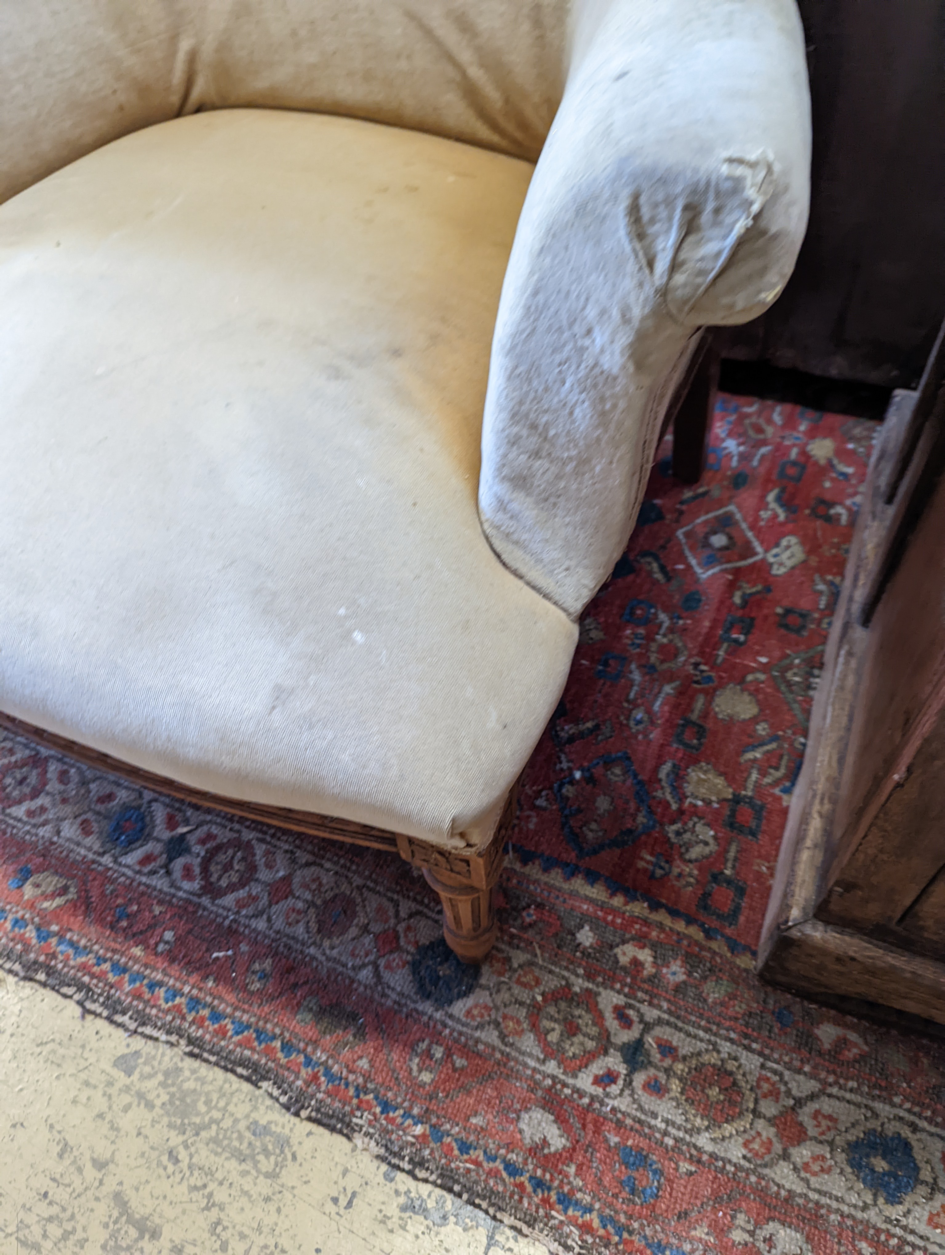 A late 19th century French carved beech armchair